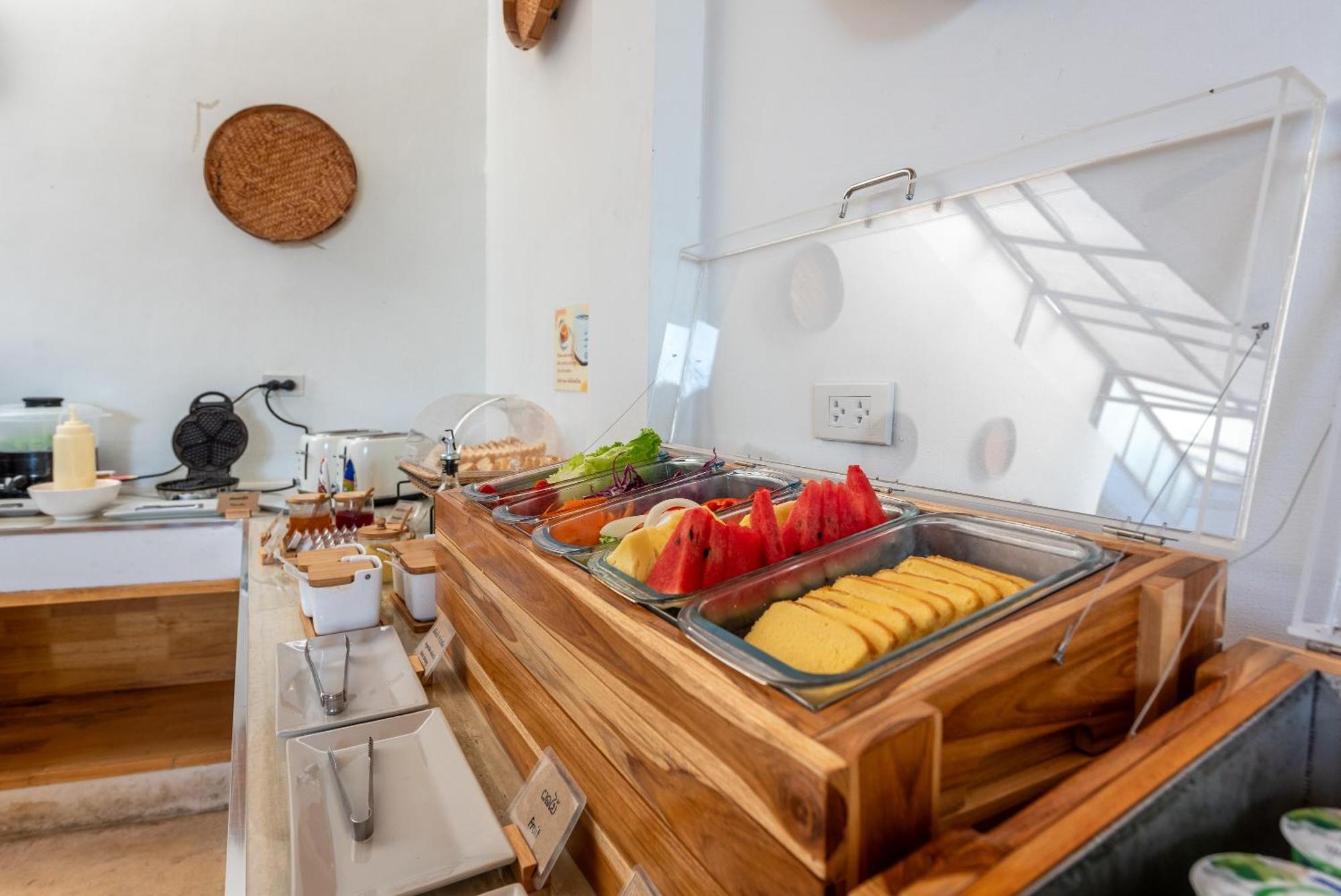 Ai Pai Hotel Bagian luar foto